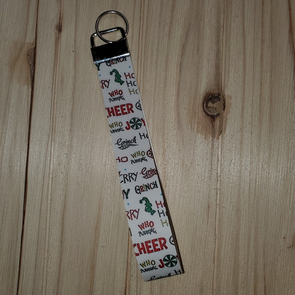 Grinch holiday tossed words keychain
